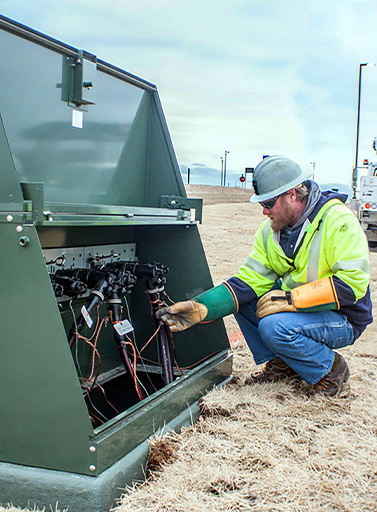 Utility Worker working on equipment